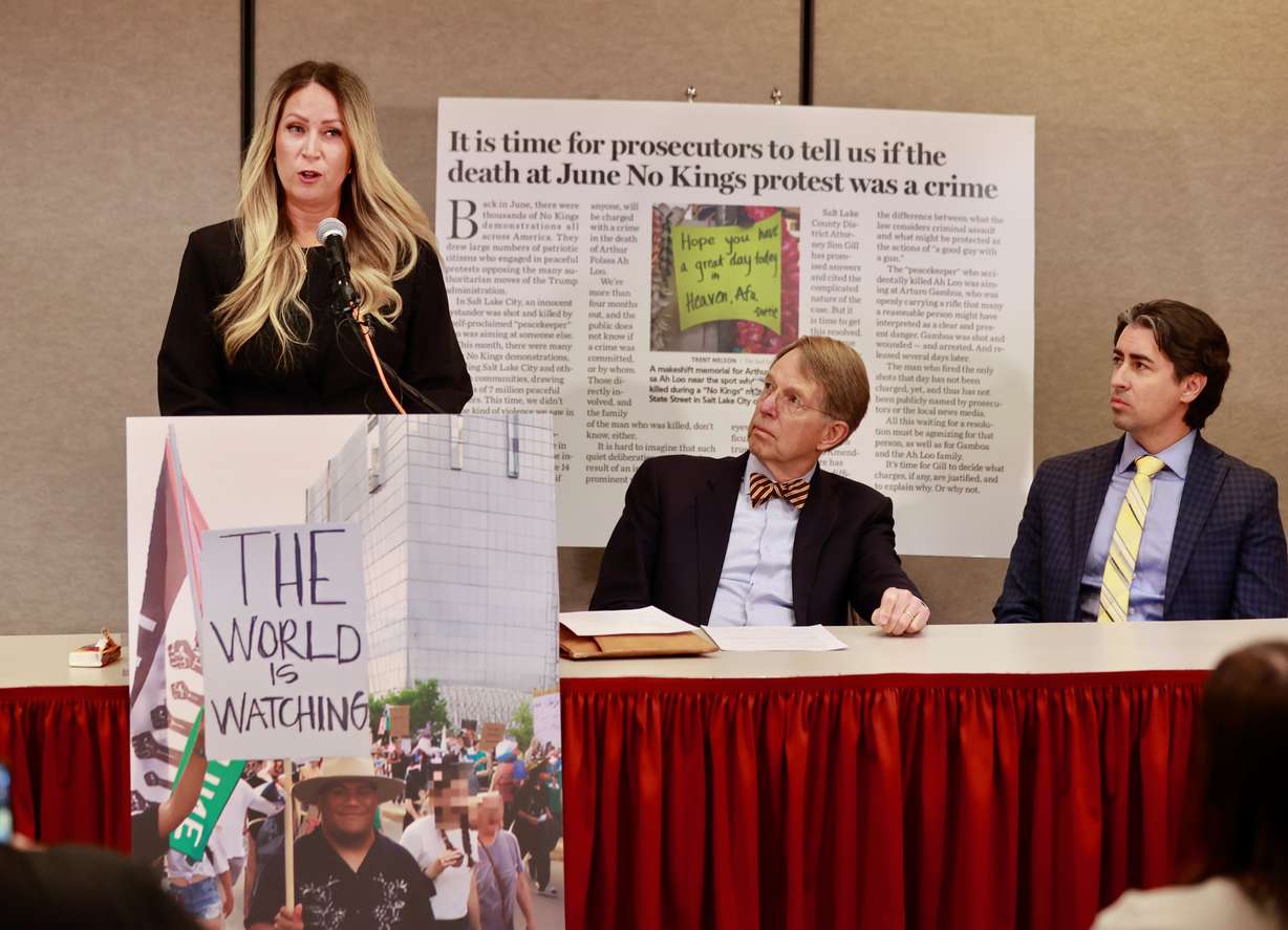 Laura Ah Lo speaks Wene,Oct. 29, 2025, about the shooting death of husband, Arthur Folasa "Afa" Ah Loo, during a "No Kings" protest in June in Salt Lake City. Her attorney, Jim McConkie, looks on. (Photo: Krstin Murphy, Deseret News)