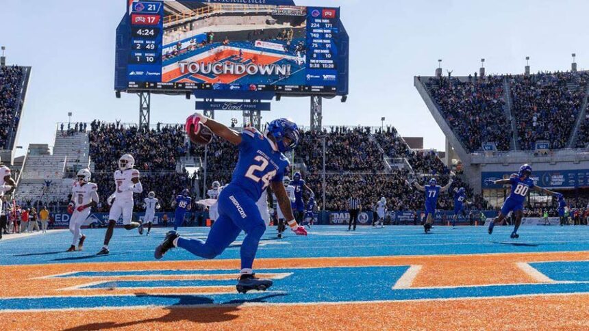 Boise State running back Dylan Riley flies through the end zone after a 49-yard touchdown run against in the 2nd quarter at Albertsons Stadium in Boise, Saturday, Oct. 18, 2025. | Darin Oswalddoswald@idahostatesman.com