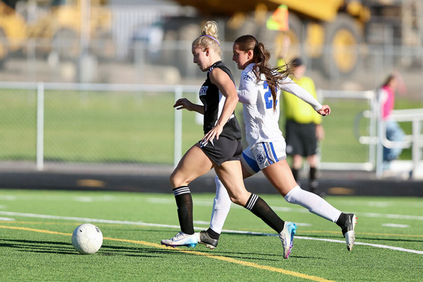 girls soccer Century's Kendyl Carey and Preston's Chazli Hymas
