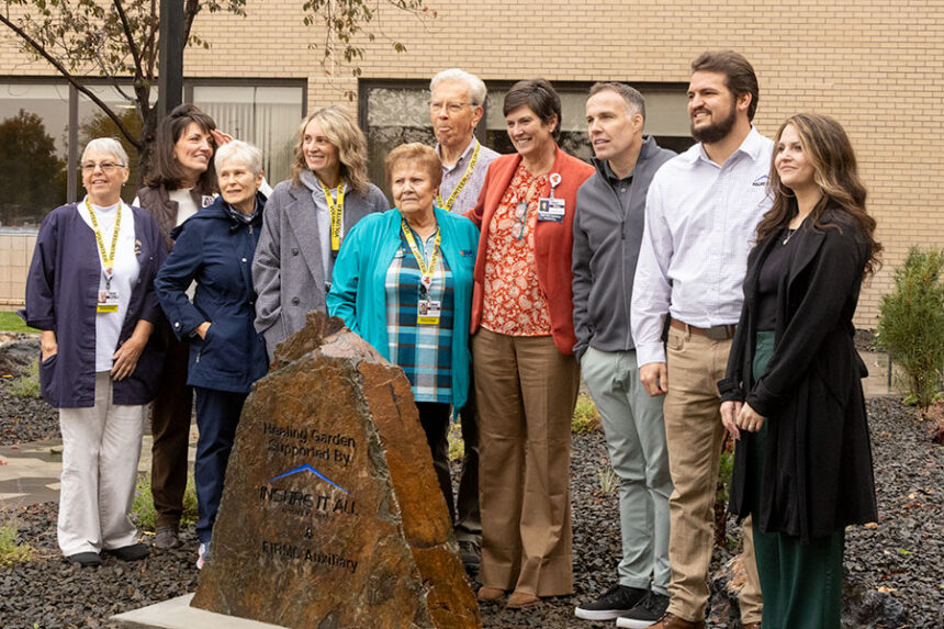 Members of Eastern Idaho Regional medical Center and Insure-It-All standing in front of EIRMC's new healing garden Thursday morning. | Daniel V. Ramirez, EastIdahoNews.com