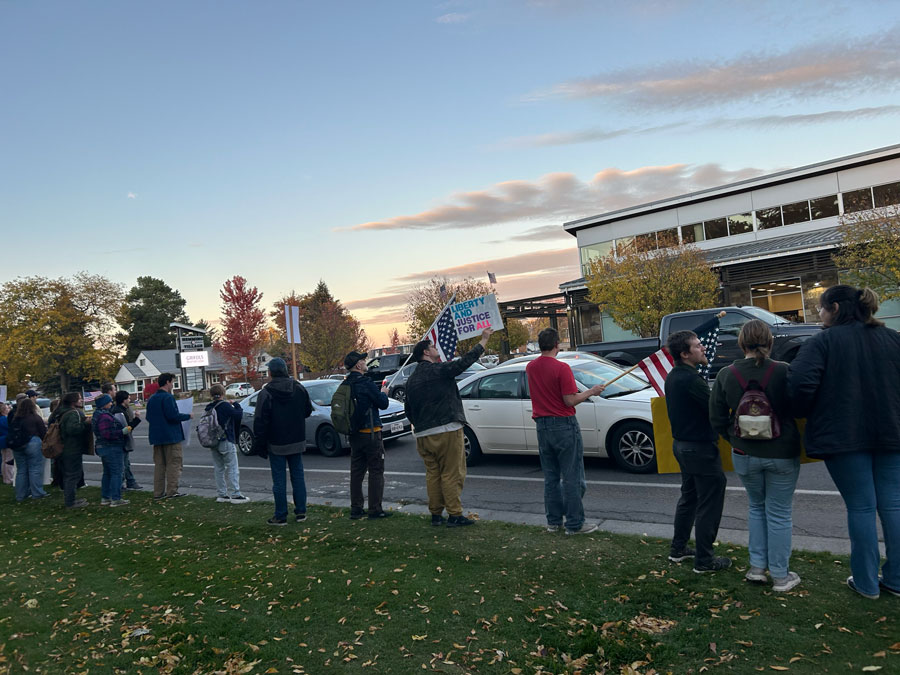 No Kings protesters lined the east side of Porter Park in Rexburg Saturday as motorists honked and waved (mostly) in support. Emily Miller