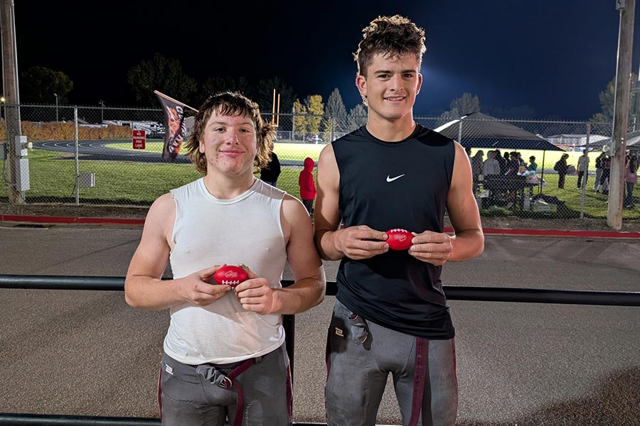 West Side football Jaxxon Bastian (left) and Chet Ward