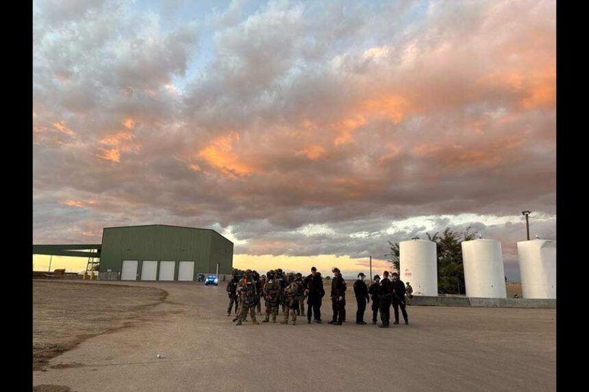 Agents stand at La Catedral Arena in Wilder, Idaho, on the evening of Oct. 19, 2025. Multiple law enforcement agencies, including the FBI and the Canyon County Sheriff’s Office, were there as part of an investigation into alleged illegal horse betting. | Sally Krutzig skrutzig@idahostatesman.com
