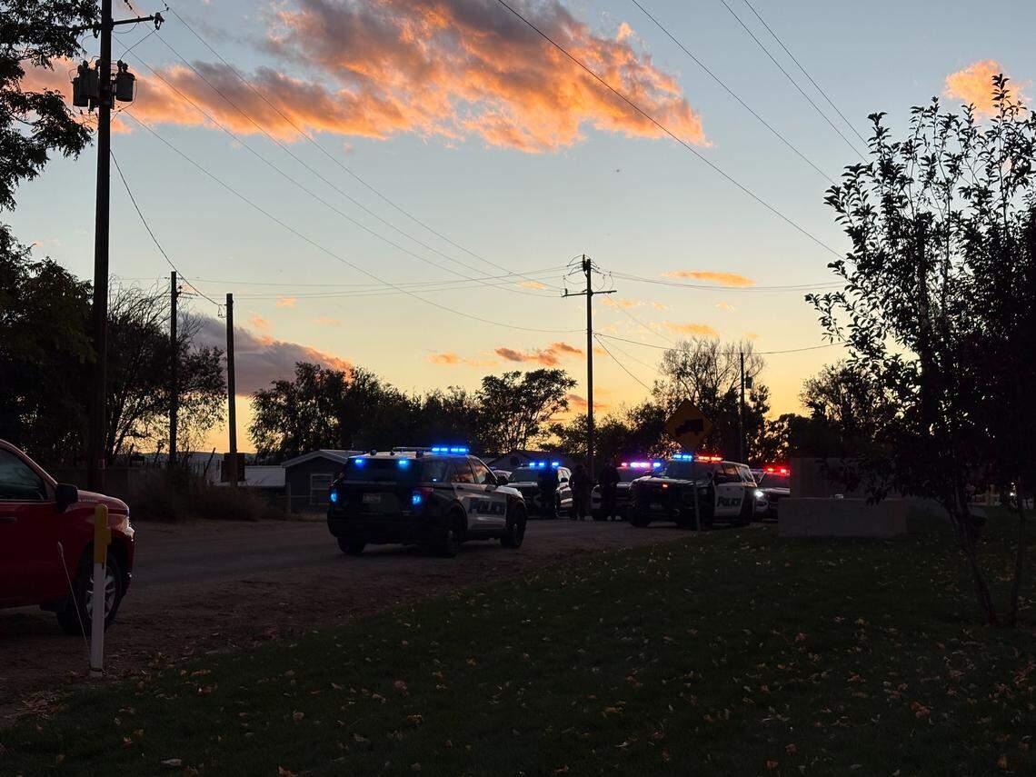 The lights on police cars still flash near La Catedral Arena after the FBI raided a property in Wilder, Idaho on Sunday. | Sally Krutzig, Idaho Statesman