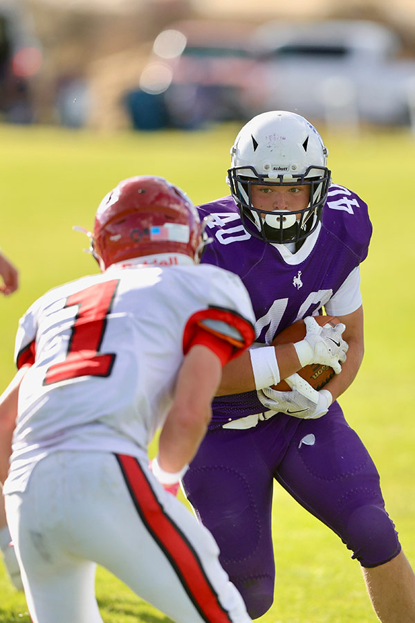 North Gem football William Wakely challenges Challis football Teage Erickson