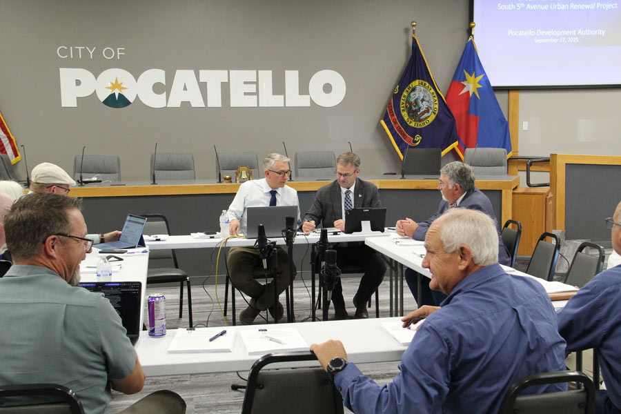 Brent McLane (left) and Mayor Brian Blad (right) have a discussion before the start of the joint work session.