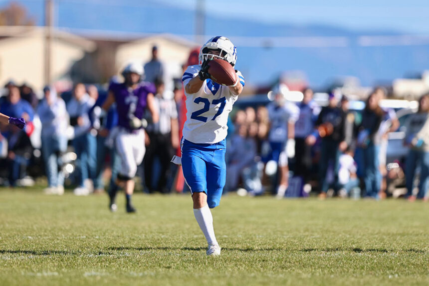 Rockland Zach Permann extends to haul in a long TD pass