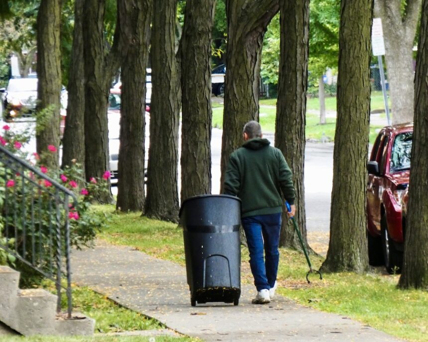 a good samaritan cleaning trash off the sidewalks 2024 11 29 02 34 29 utc