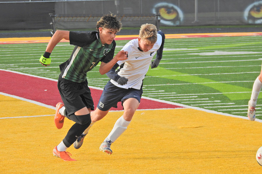 Blackfoot Fernando Orozco races Pocatello Emmit Huff to the ball