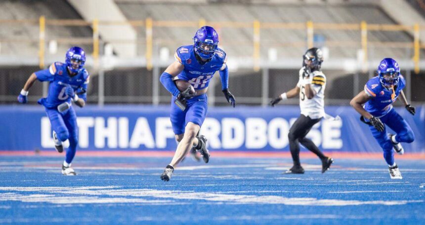 Boise State linebacker Boen Phelps returns an interception 33 yards for a touchdown against App State last weekend. Kyle Green For The Idaho Statesman