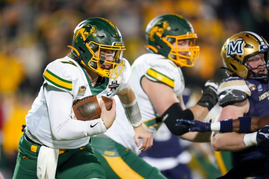 FILE - North Dakota State quarterback Cam Miller runs with the ball against Montana State during the first half of the FCS Championship NCAA college football game, Jan. 6, 2025, in Frisco, Texas. (AP Photo/Julio Cortez, File)