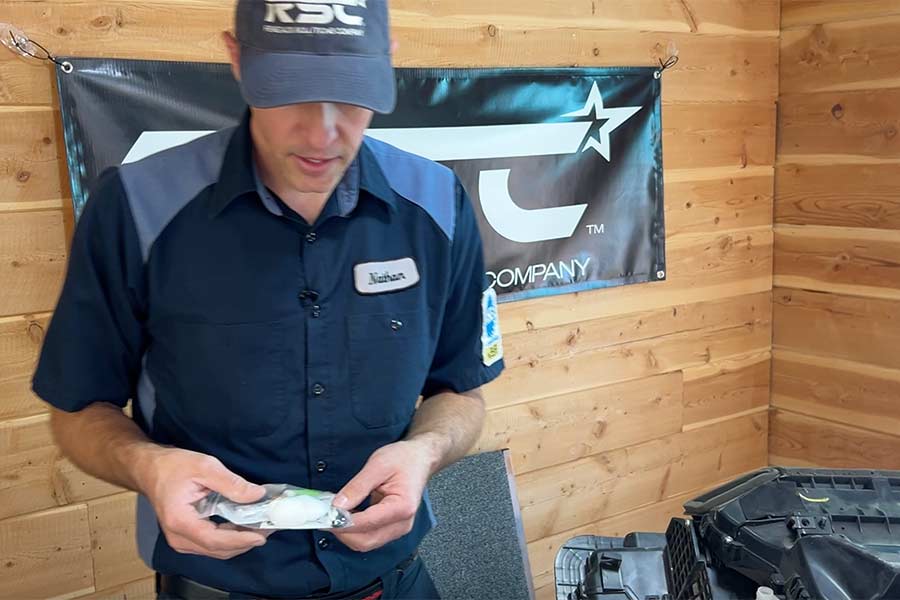 Hansen explaining how his repair kits work. | Rett Nelson, EastIdahoNews.com