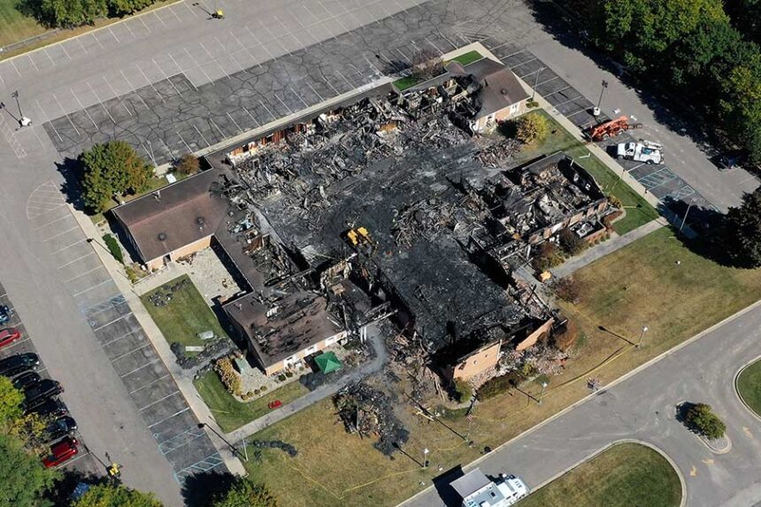 In this aerial view, the burned remains of the Church of Jesus Christ of Latter-day Saints, on October 1, in Grand Blanc, Michigan. Mandatory Credit: Gregory Shamus/Getty Images via CNN Newsource