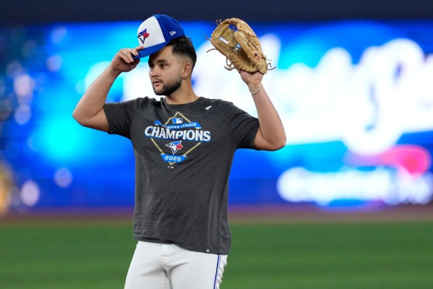 Toronto Blue Jays' Bo Bichette runs drills during a World Series baseball media day, Thursday, Oct. 23, 2025, in Toronto. The Toronto Blue Jays face the Los Angeles Dodgers in Game 1 on Friday. (AP Photo/David J. Phillip)