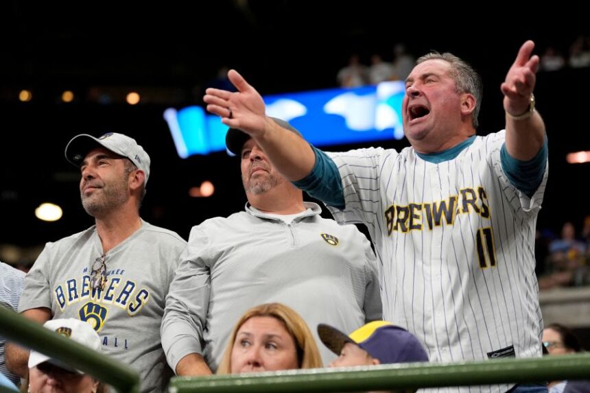 Milwaukee Brewers fans react during the sixth inning in Game 2 of baseball's National League Championship Series against the Los Angeles Dodgers, Tuesday, Oct. 14, 2025, in Milwaukee. (AP Photo/Brynn Anderson)