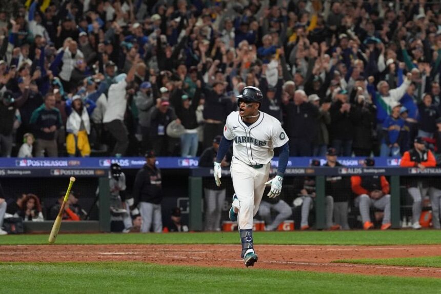 Seattle Mariners second baseman Jorge Polanco reacts after hitting an RBI-single for shortstop J.P. Crawford to score the game-winning run during the 15th inning in Game 5 of baseball's American League Division Series against the Detroit Tigers, Friday, Oct. 10, 2025, in Seattle. (AP Photo/Lindsey Wasson)