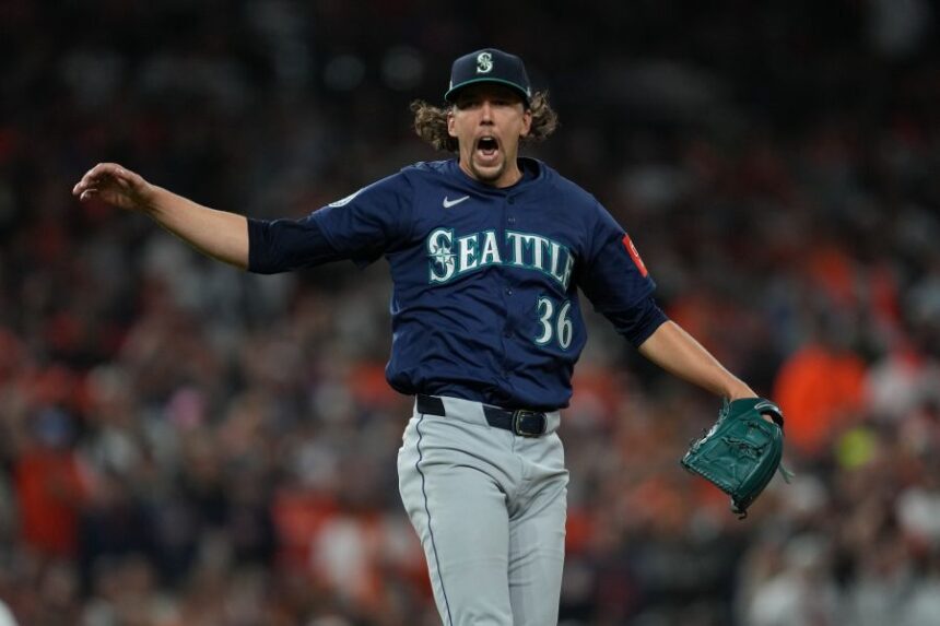 Seattle Mariners starting pitcher Logan Gilbert reacts after striking out Detroit Tigers' Parker Meadows to end the second inning in Game 3 of baseball's American League Division Series Tuesday, Oct. 7, 2025, in Detroit. (AP Photo/Paul Sancya)