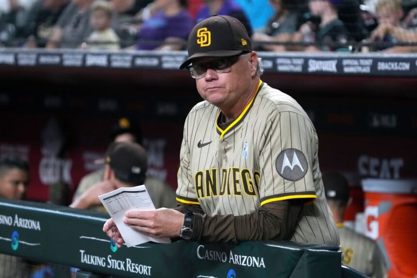 FILE - San Diego Padres manager Mike Shildt (8) in the first inning during a baseball game against the Arizona Diamondbacks, June 15, 2025, in Phoenix. (AP Photo/Rick Scuteri, File)