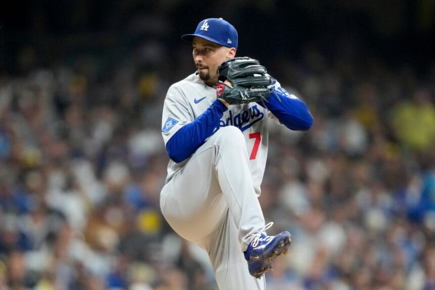 Los Angeles Dodgers pitcher Blake Snell throws against the Milwaukee Brewers during the first inning in Game 1 of baseball's National League Championship Series, Monday, Oct. 13, 2025, in Milwaukee. (AP Photo/Brynn Anderson)