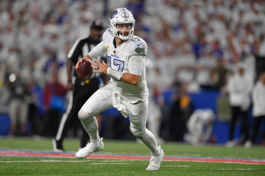 Buffalo Bills quarterback Josh Allen (17) looks to throws against the New England Patriots during the second half of an NFL football game, Sunday, Sept. 5, 2025, in Orchard Park, N.Y. (AP Photo/Adrian Kraus)