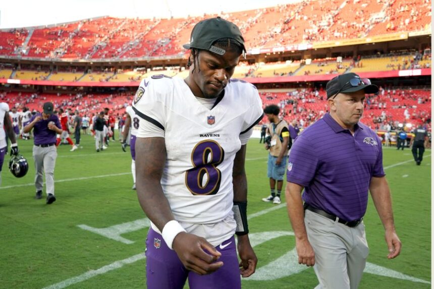 Baltimore Ravens quarterback Lamar Jackson heads off the field following an NFL football game against the Kansas City Chiefs Sunday, Sept. 28, 2025, in Kansas City, Mo. (AP Photo/Ed Zurga)
