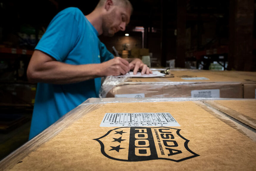 workers receive USDA food