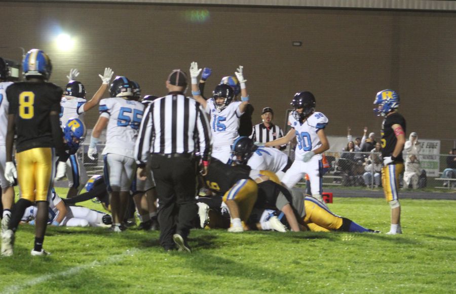 West Jefferson players celebrate a touchdown run by Ryker Burtenshaw. | Allan Steele, EastIdahoSports.com.