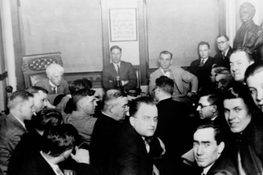 FILE - This 1921 file photo shows Judge Kenesaw Mountain Landis, rear left, as Chicago White Sox players, Charles "Swede" Risberg, center left, and Arnold "Chick" Gandil, look on during the investigation of the infamous "Black Sox" scandal in Chicago. (AP Photo, file)