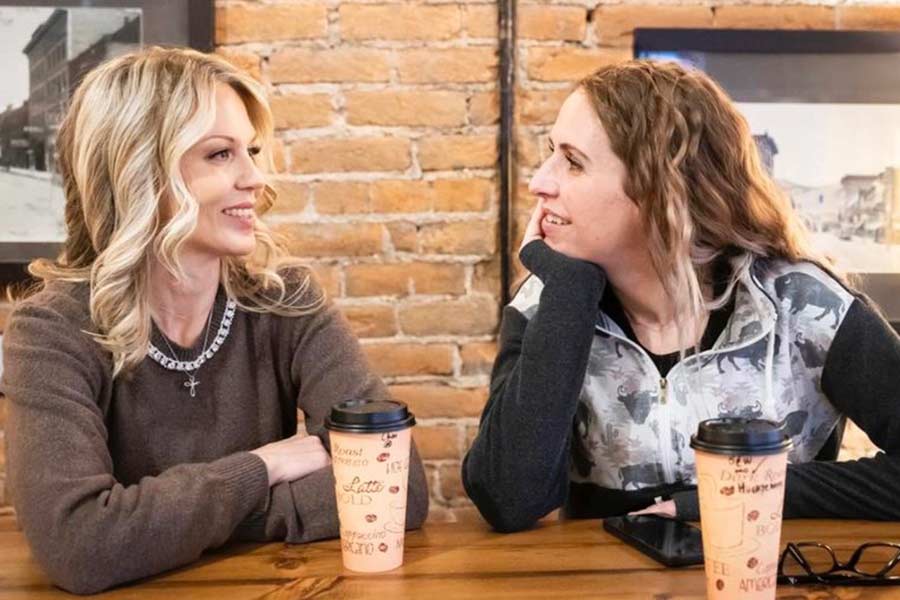 Stephanie Taylor-Thompson, left, with her former parole officer. | Courtesy Stephanie Taylor-Thompson