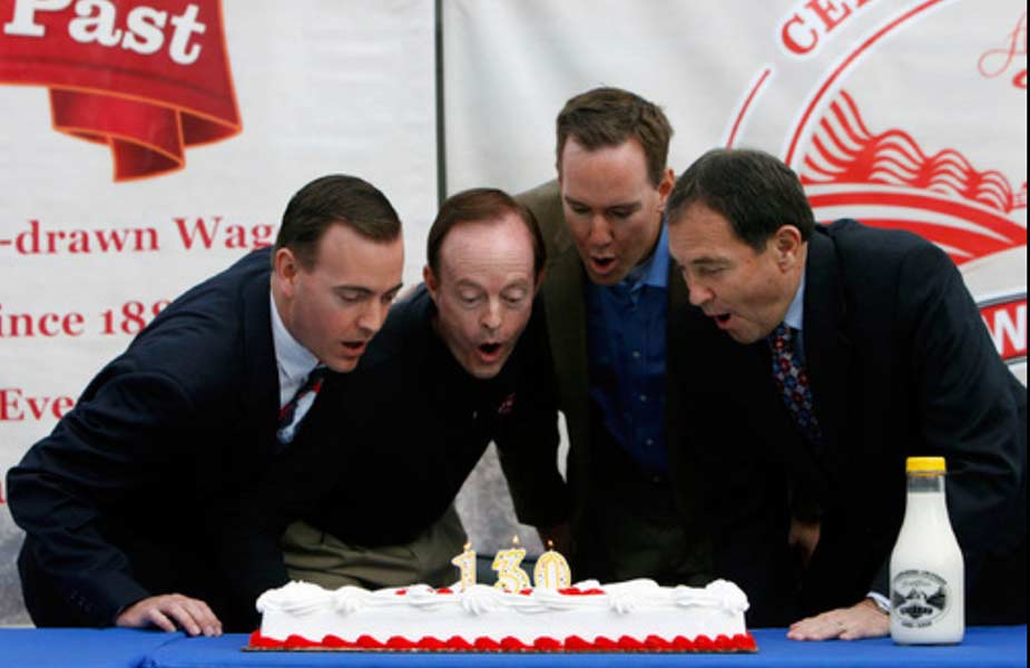 Winder Dairy celebrated its 130th birthday in 2010. Mike Winder, left, his father, Kent, and others are seen blowing out birthday candles. Winder Farms won “Best of State Dairy” in Utah, was listed on Mountain West Capital Network’s “Utah 100” as one of the fastest-growing businesses in the state that year, and also was named among Inc. magazine’s 5,000 fastest-growing companies in the country. | Courtesy photo