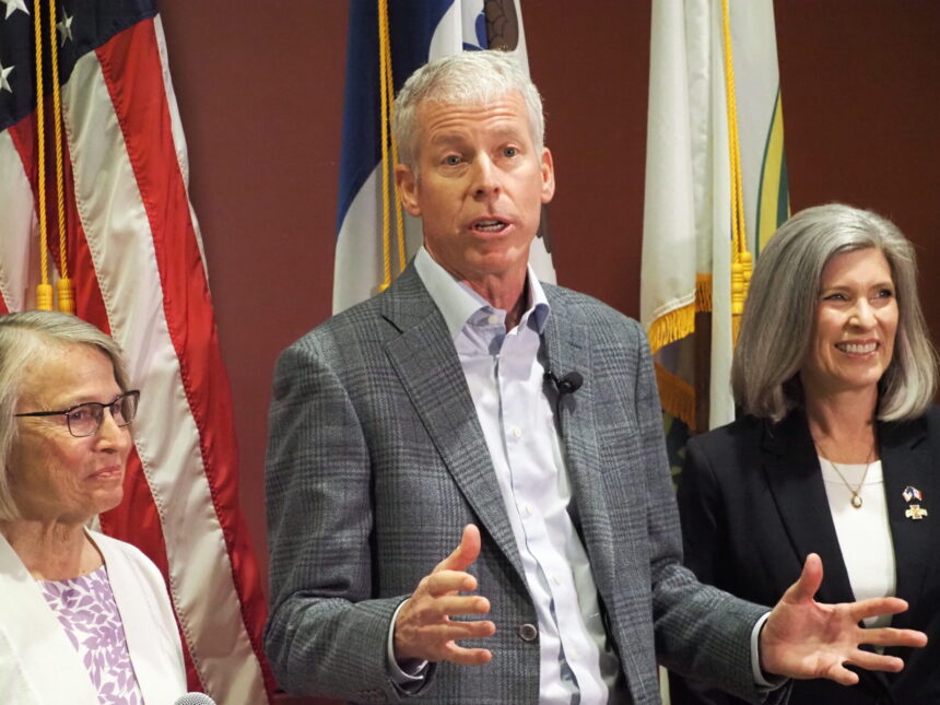 U.S. Secretary of Energy Chris Wright visited the Ames National Laboratory Aug. 14, 2025, joined by U.S. Rep. Mariannette Miller-Meeks, left, and Sen. Joni Ernst, right, as well as other Republican lawmakers. | Robin Opsahl, Iowa Capital Dispatch