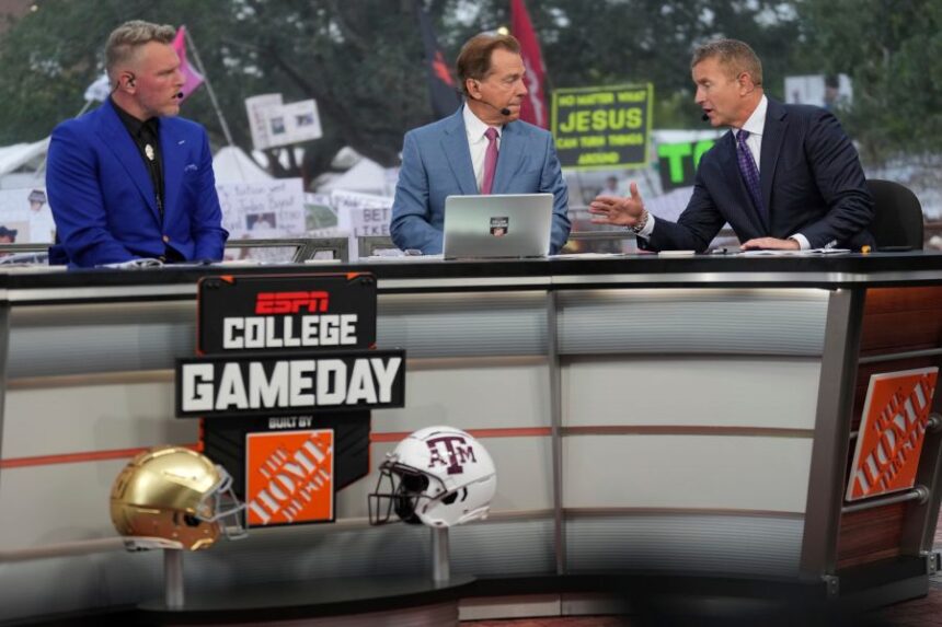 FILE - From left, Pat Mcafee, Nick Saban and Kirk Herbstreit talk on the set of ESPN College Gameday on Saturday, Aug. 31, 2024, in College Station, Texas. (AP Photo/Sam Craft, File)
