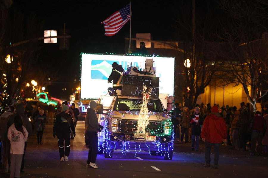 The Idaho Power float makes its way down Main Street during the 2025 Christmas Night Lights Parade.  