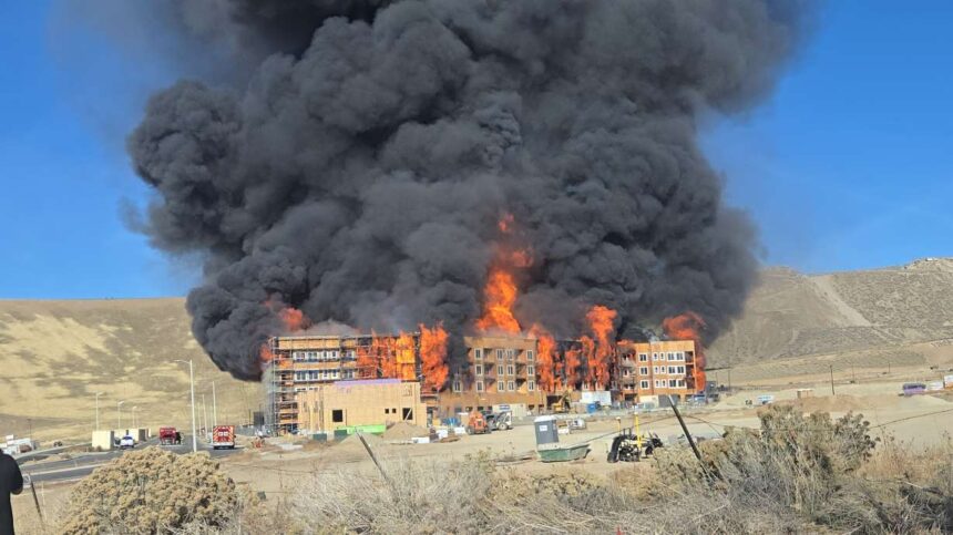 A large fire broke out Sunday morning in the Lehi-Draper area, sending thick black smoke and flames high into the air as witnesses reported hearing what may have been an explosion. | Courtesy Shishir Dixit