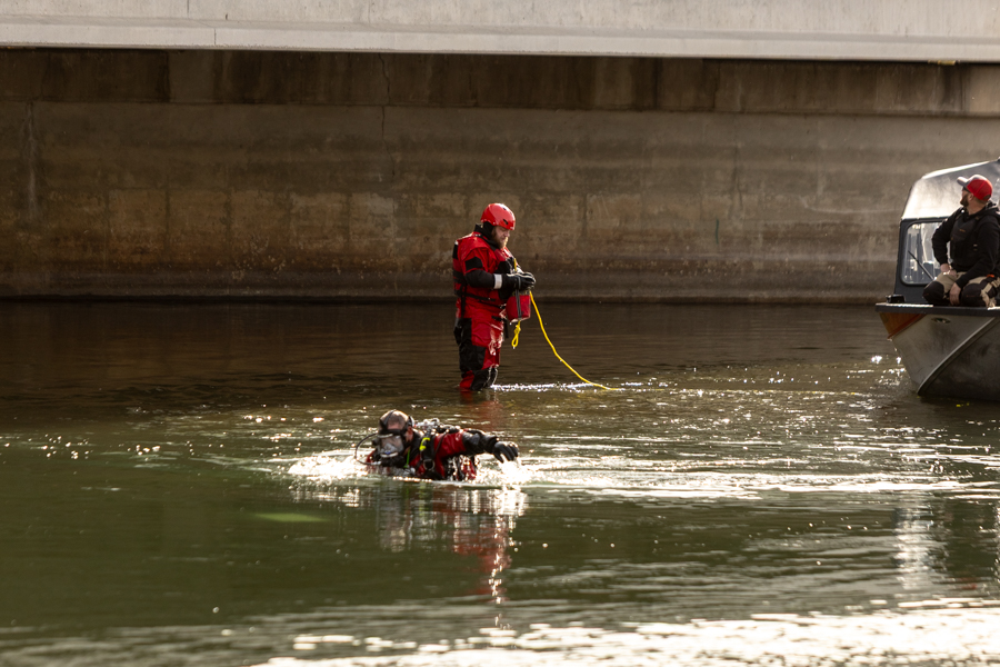 Divers in the water attempting to recover pieces of the plane from the Snake River. | Daniel V. Ramirez, EastIdahoNews.com