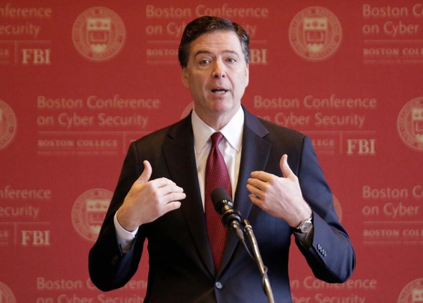 FBI Director James Comey gestures as he speaks on cyber security at the first Boston Conference of Cyber Security at Boston College, March 8, 2017, in Boston. | Stephan Savoia, Associated Press
