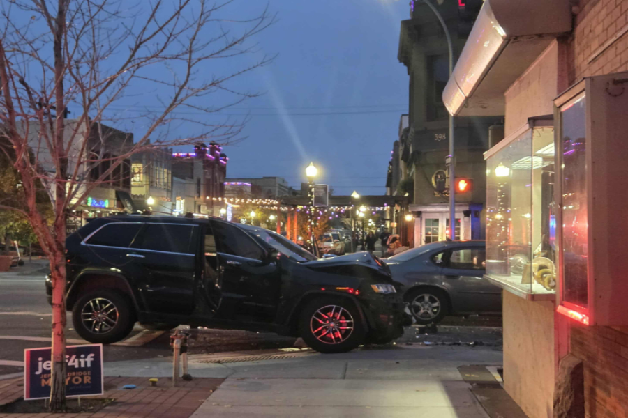 An SUV on the sidewalk in front of a business downtown Idaho Falls. | Amy Sunderland, EastIdahoNews.com