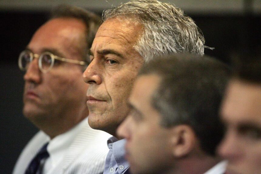 In this July 30, 2008, file photo, Jeffrey Epstein, center, appears in court in West Palm Beach, Florida. | Uma Sanghvi, The Palm Beach Post via Associated Press