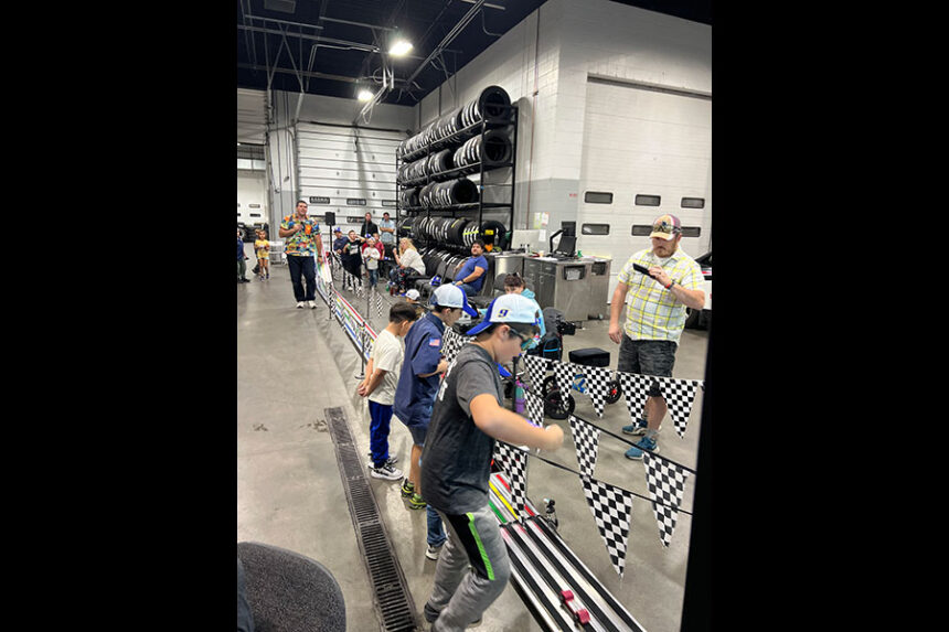 Kids racing at last year's Corporate Pinewood Derby at Teton Toyota. | Courtesy Elias Lopez