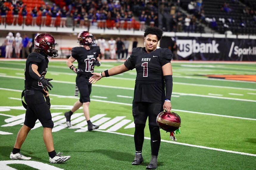 Rigby Amani Morel congratulates defense for a fourth-down stop late in the fourth