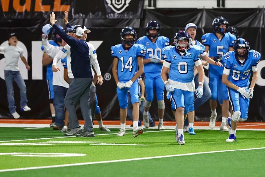 West Jefferson floods the field after taking a 21-20 lead on a successful two-point conversion with 1:17 left in the game