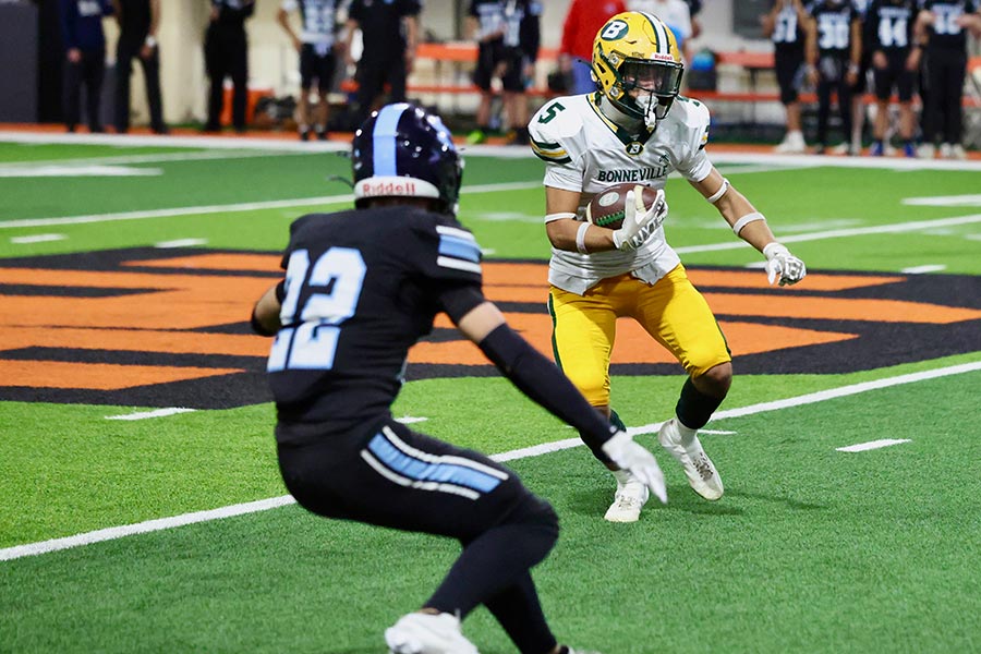 Bonneville Kaine Rodriguez looks for room to run after the catch