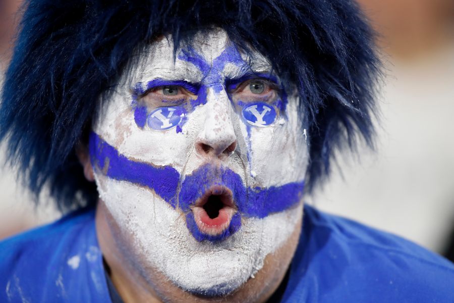 A BYU fan cheers during the second half of an NCAA college football game against TCU Saturday, Nov. 15, 2025, in Provo, Utah. (AP Photo/George Frey)