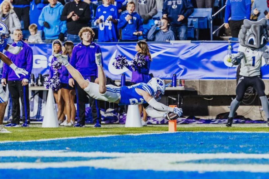 BYU safety Tanner Wall converts an interception into a touchdown during the second half of a Big 12 football game against TCU, Saturday, Nov. 15, 2025 at LaVell Edwards Stadium in Provo, Utah. (Photo: Tyler Staten for KSL.com)