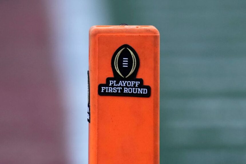 FILE - A playoff logo is seen on an end zone marker during the first half between Texas and Clemson in the first round of the College Football Playoff, Dec. 21, 2024, in Austin, Texas. (AP Photo/Eric Gay, file)