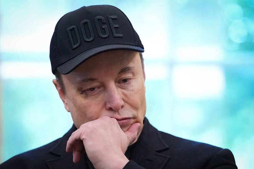 Elon Musk wears a DOGE hat in the Oval Office of the White House on May 30. Mandatory Credit: Kevin Dietsch/Getty Images/File via CNN Newsource