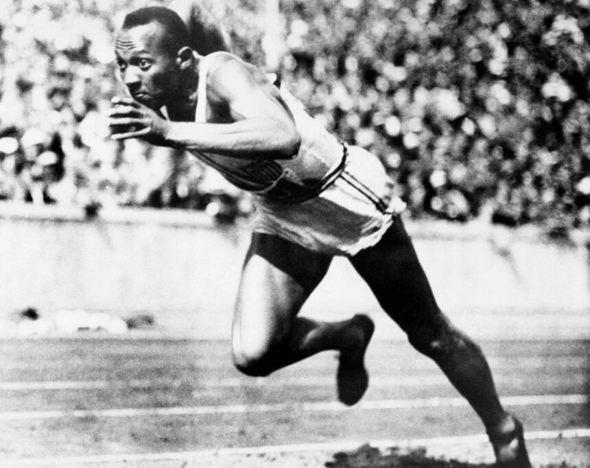 FILE -- In this Aug. 14, 1936, file photo, Jesse Owens competes in one of the heats of the 200-meter run at the 1936 Olympic Games in Berlin. (AP Photo/File)