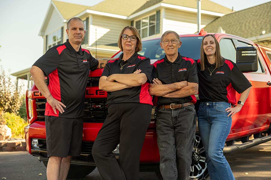 The Casanovas, center, with their son, Michael, left, and daughter Heather | Courtesy Heather Lallatin