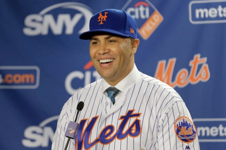 FILE - New York Mets' Carlos Beltran smiles during an introductory baseball news conference in New York, Nov. 4, 2019. (AP Photo/Seth Wenig, File)