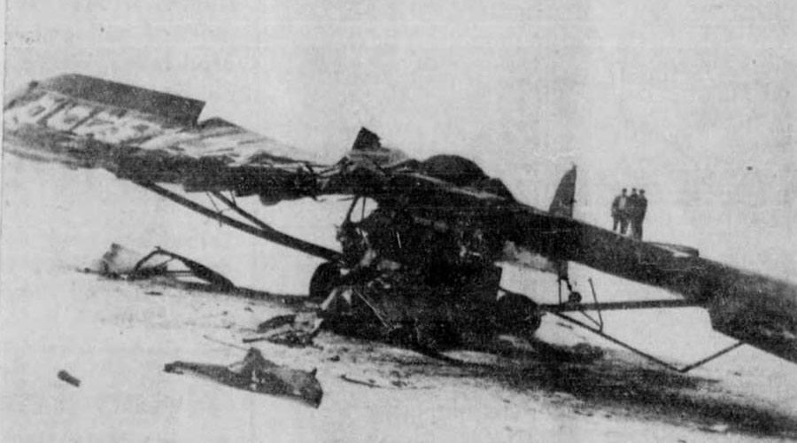 The broken body of Richard Dale Chantrill, 27 year old Rexburg pilot, was lifted from the wreckage of this light airplane at the Idaho Falls Airport Friday morning. The plane stalled after a takeoff and then dived nose first 300 feet at the northern end of the airport. Caption dated Dec. 21, 1951.